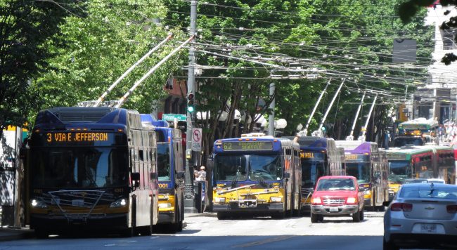 3rd Avenue, with many buses and a few cars